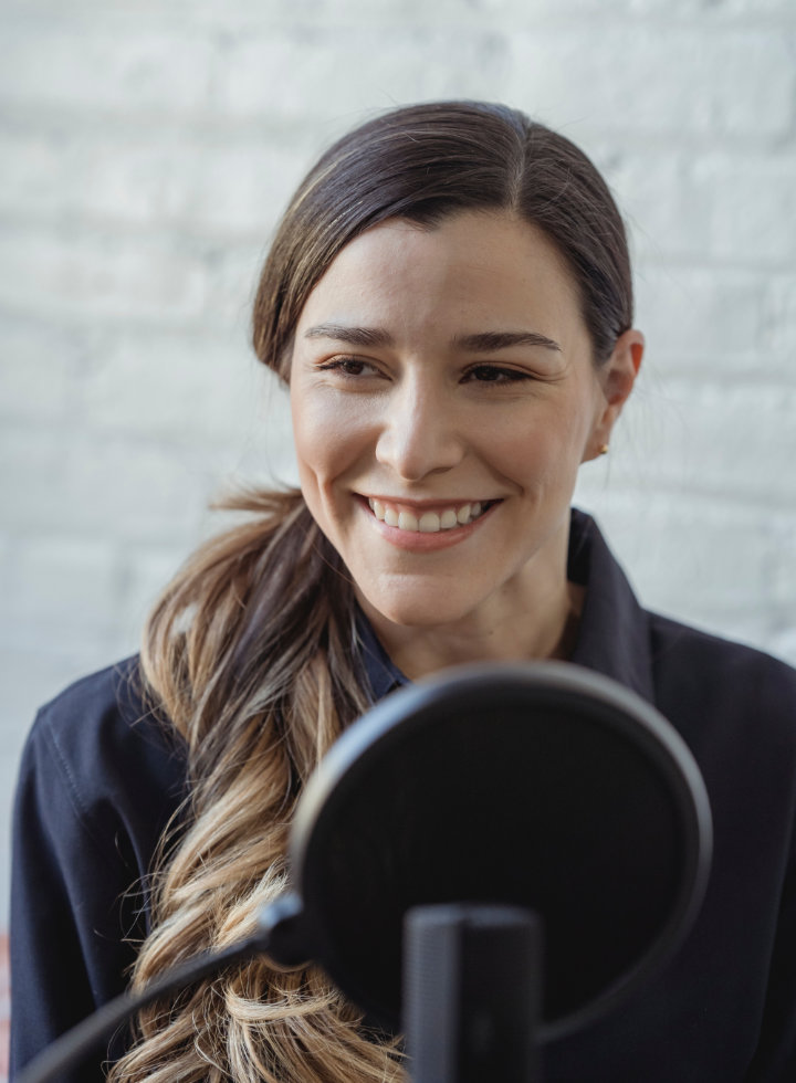 Happy Lady On Microphone